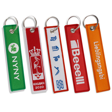 Custom Brand Logo Embroidered Key Tag Remove Before Flight Keychains